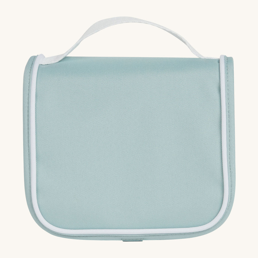 Olli Ella See-Ya Wash Bag in a Steel Blue colour pictured on a plain background