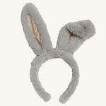 Olli Ella grey Smoke coloured fluffle bunny ears headband on a plain background. 