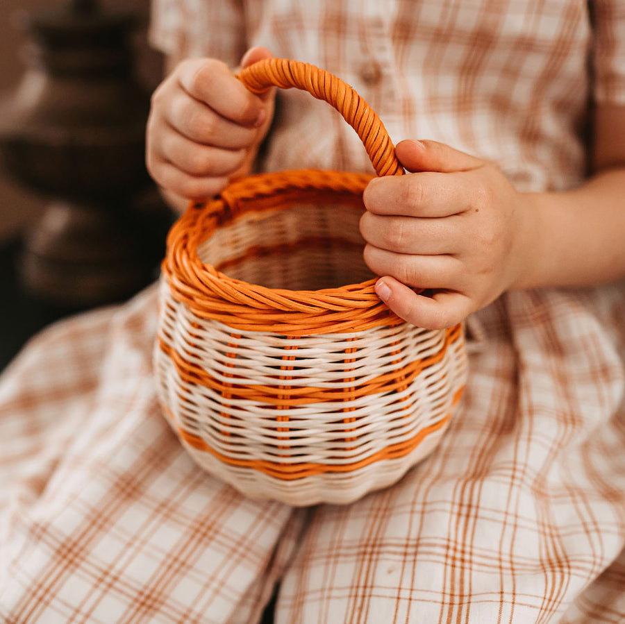 basket shown with mini pumpkin inside