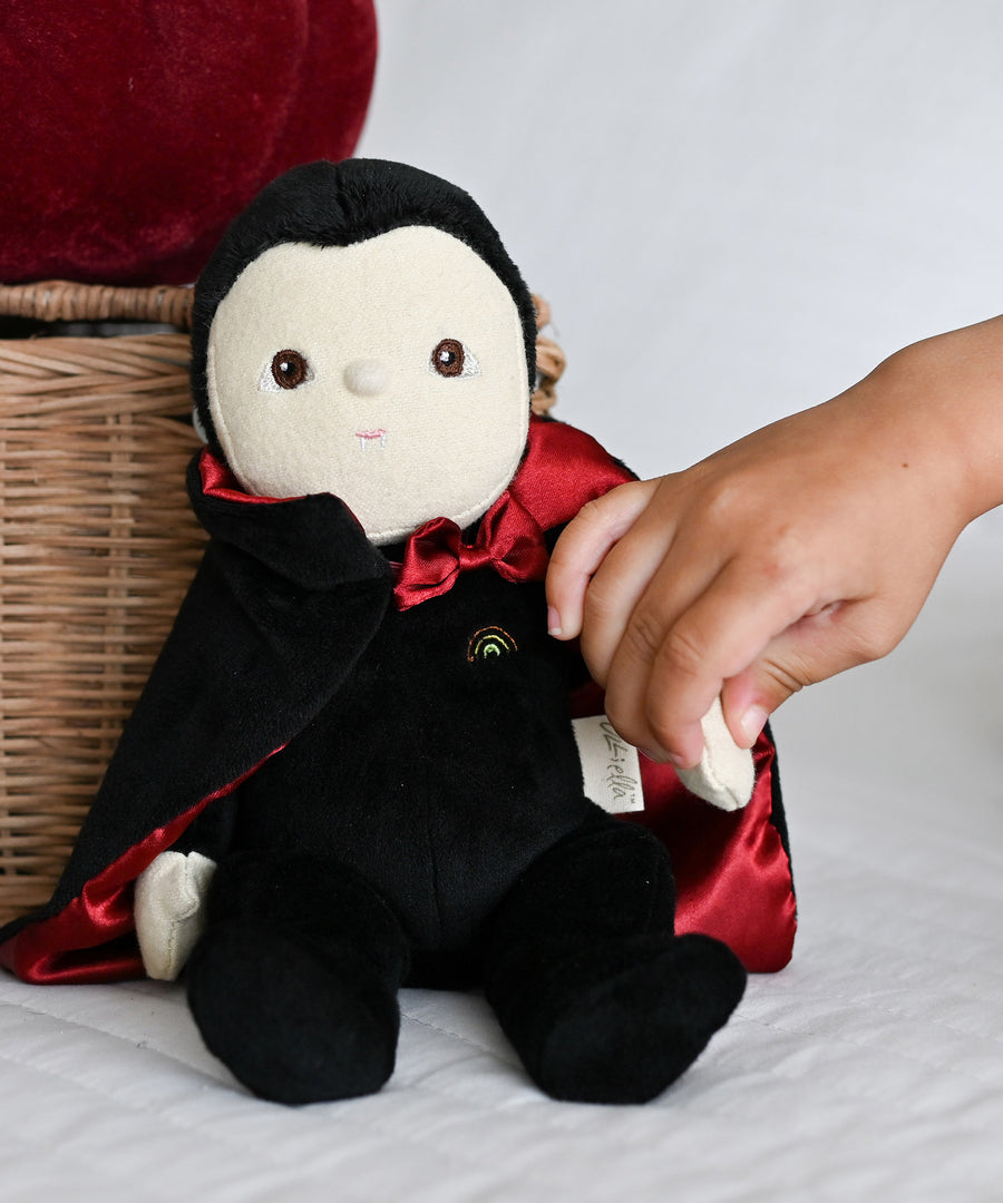 hand holding olli ella vampire doll