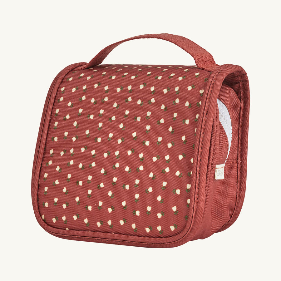 Olli Ella See-Ya Washbag in Sweethear Red design with small white flowers on a red fabric background