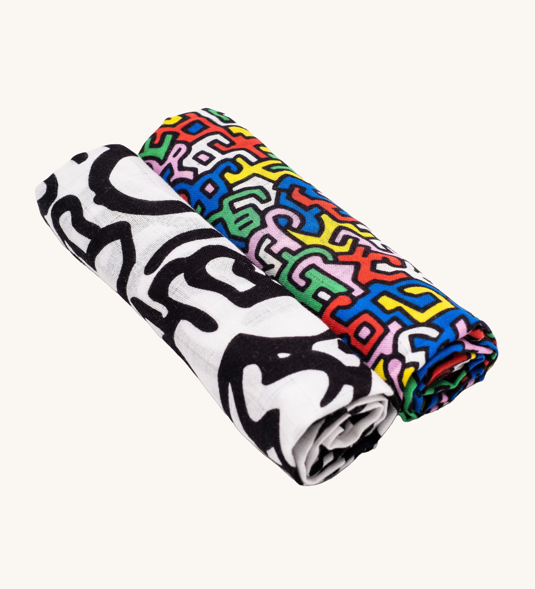 Etta Loves X Keith Haring Organic Cotton Baby Muslin Squares - 2 Pack, in 'Baby' and 'Brazil' print