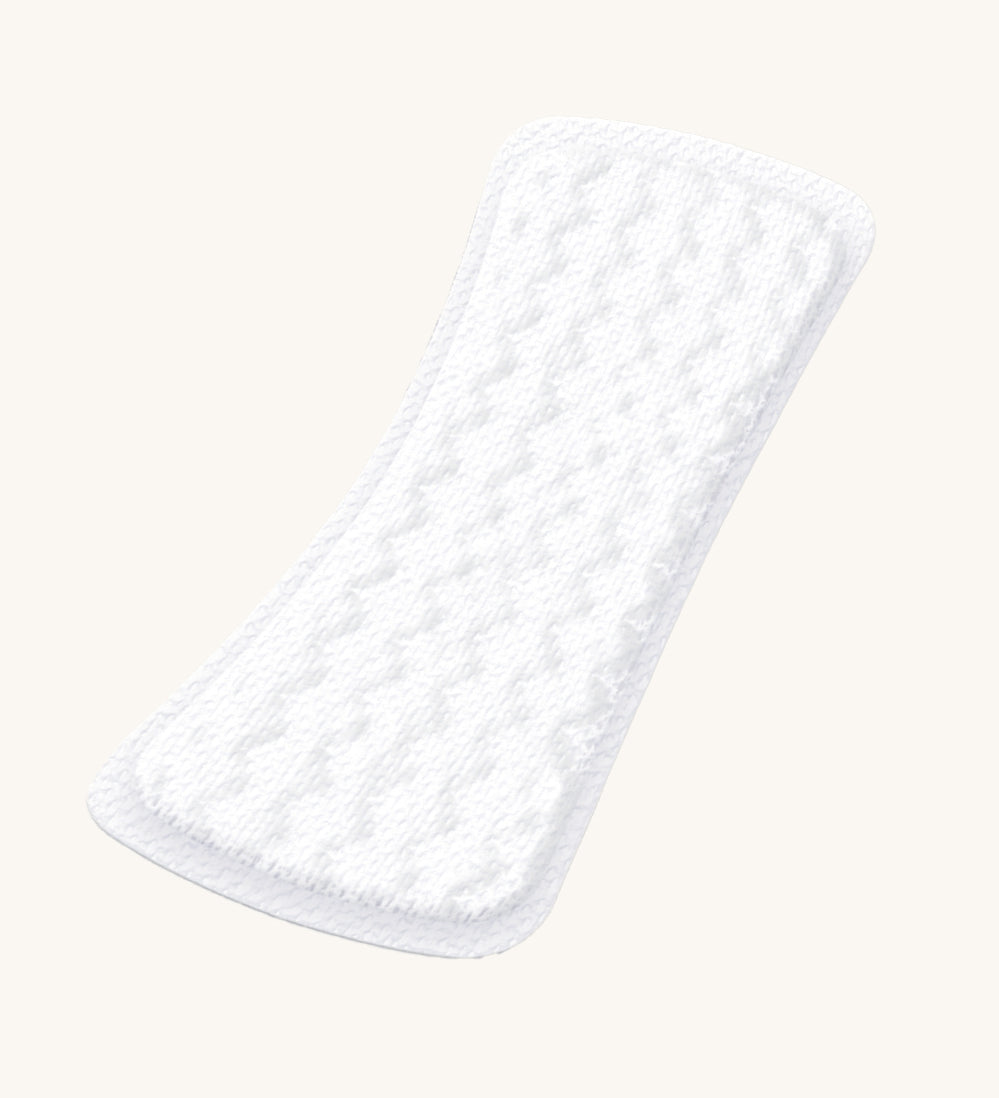 A single Organyc  Light Flow Panty Liners shown out of it's packaging on a plain background.