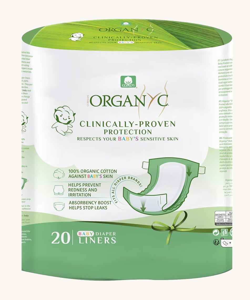 Organyc organic cotton nappy liners in the packet on a plain background. 