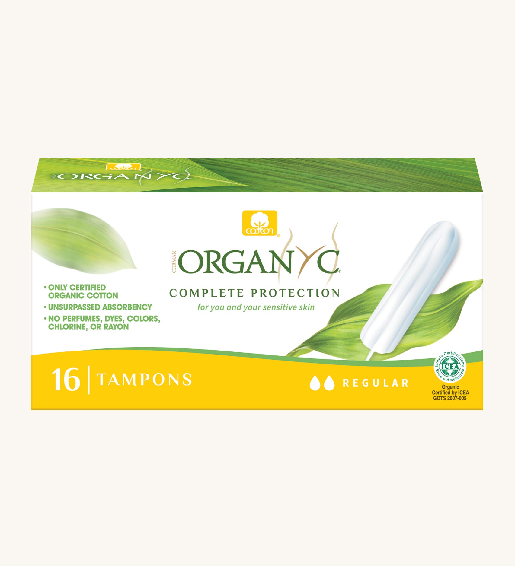 Regular tampons in a box on a cream background.