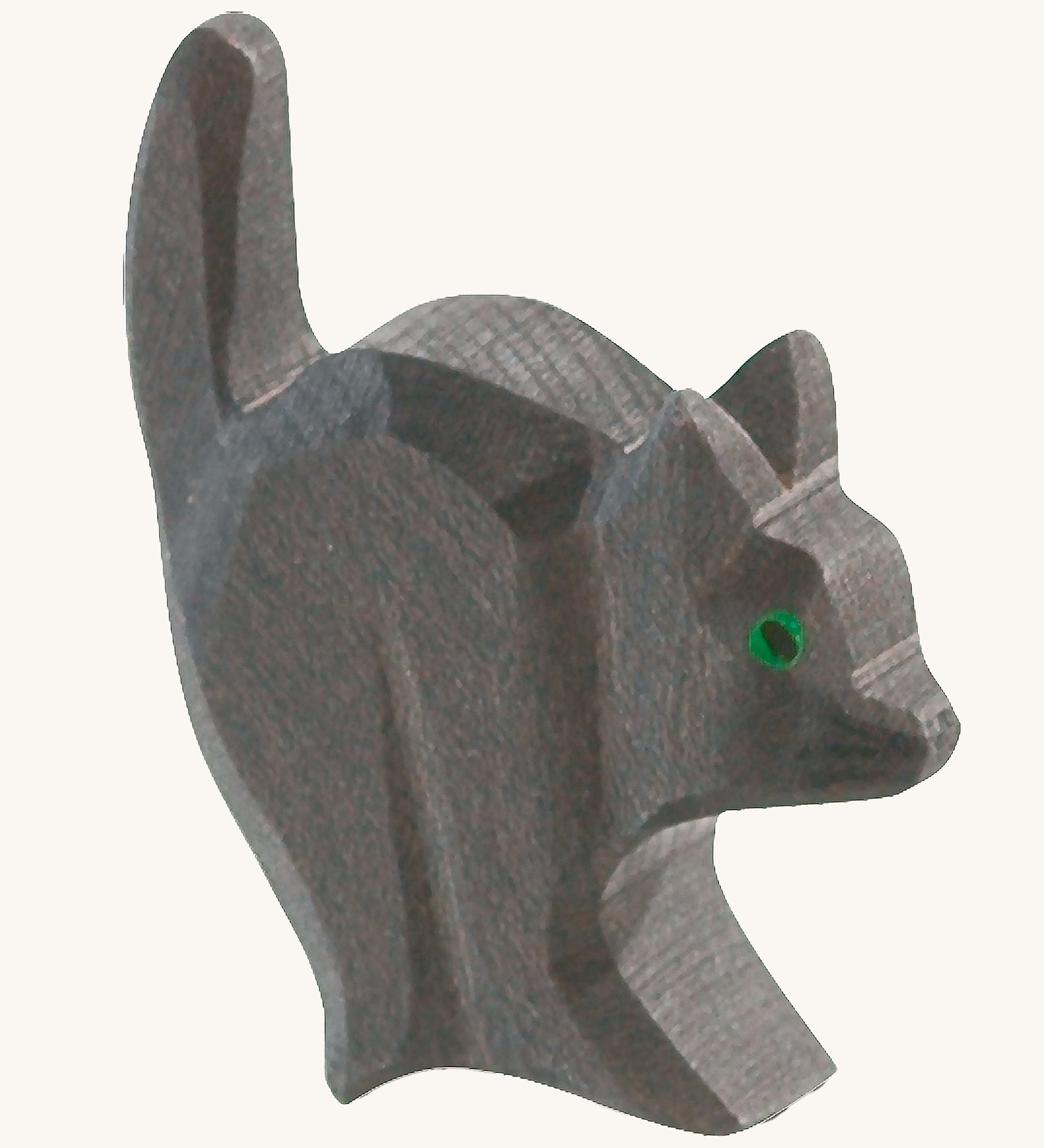 A black wooden Ostheimer cat for the witch figure on a cream background.