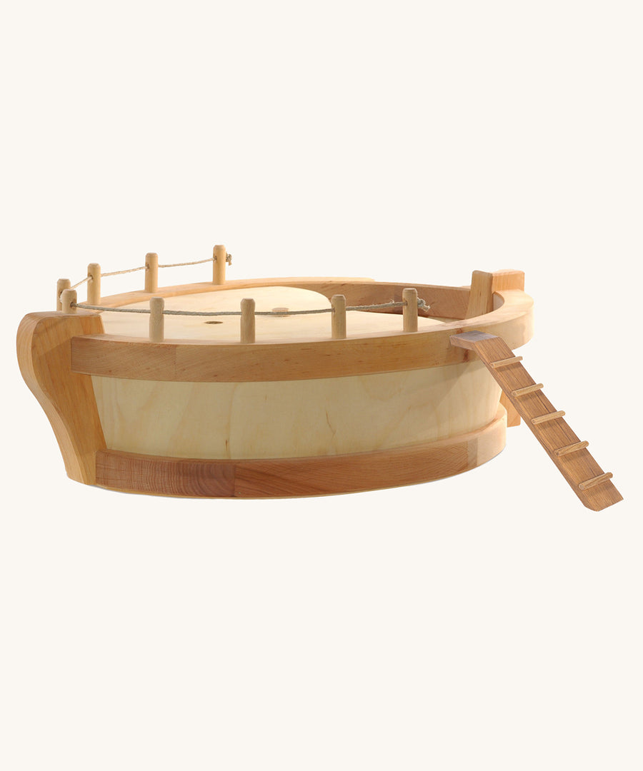 Ostheimer wooden boat ark body toy on a plain background. 