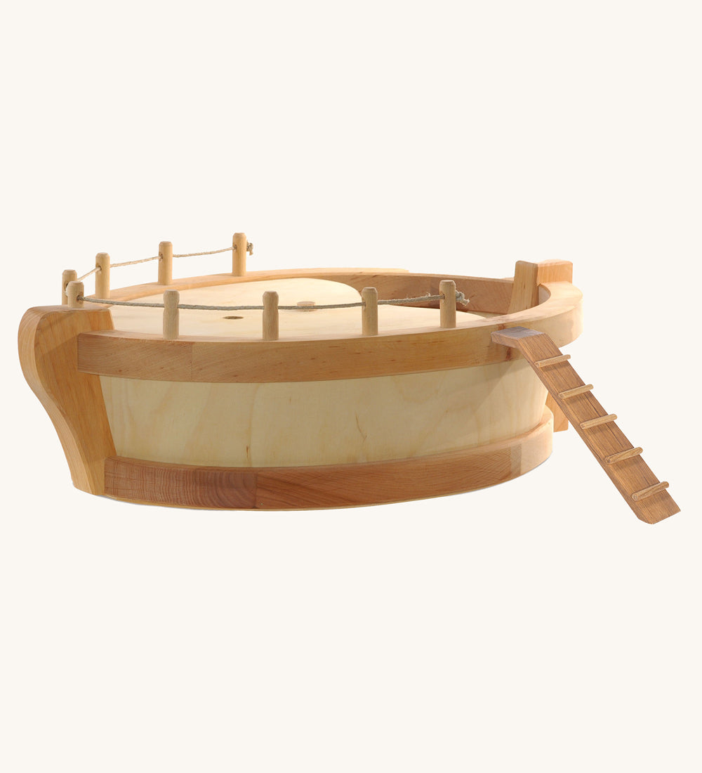 Ostheimer wooden boat ark body toy on a plain background. 