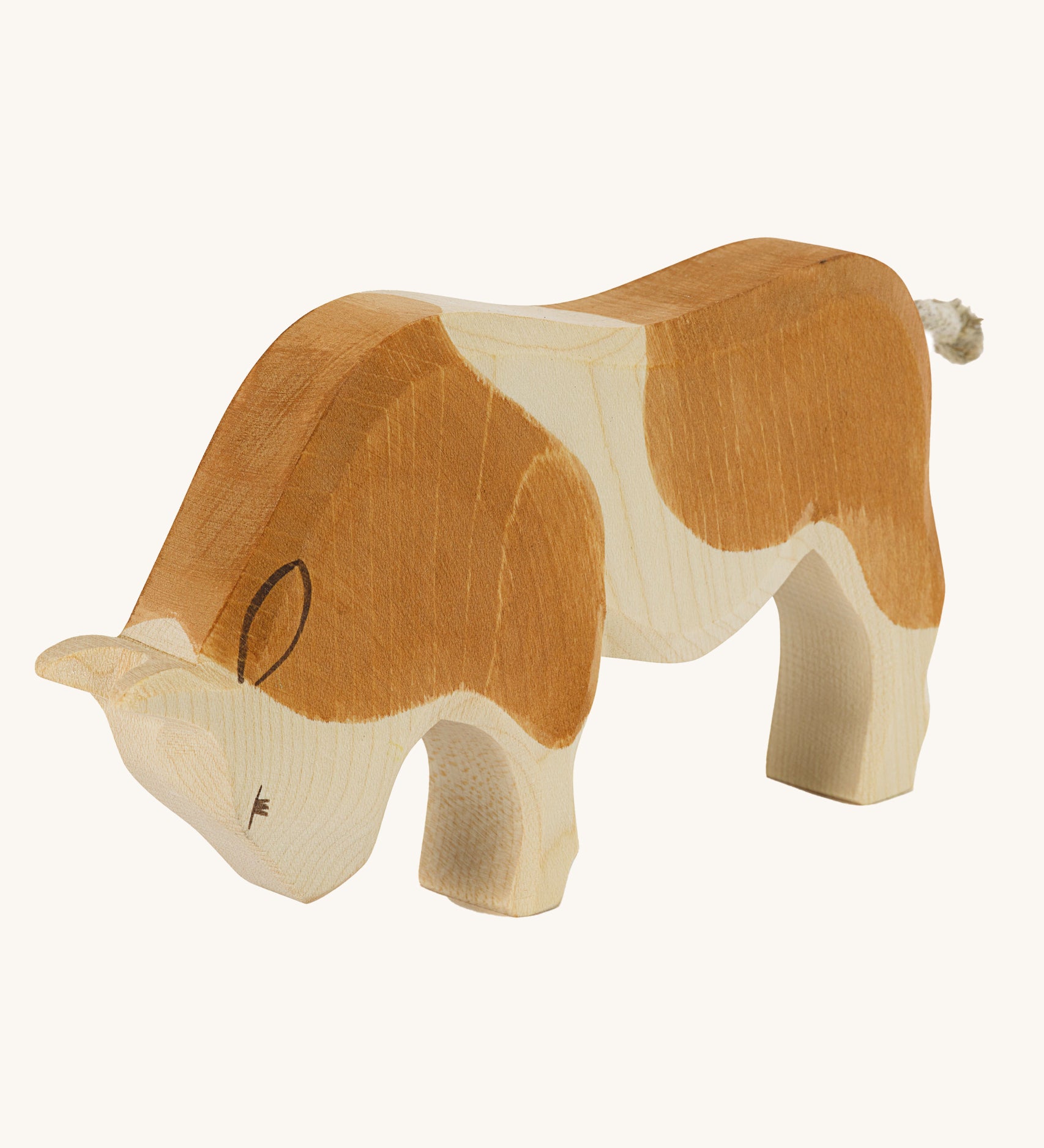 Ostheimer Brown Ox wooden toy on a plain background. 