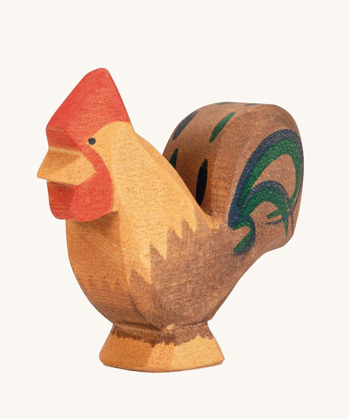 Ostheimer Brown Rooster wooden toy figure on a plain background. 