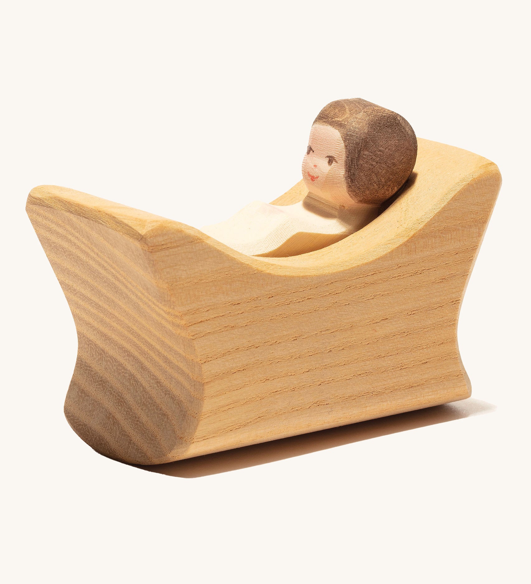 Ostheimer Child In Cradle on a plain background. 