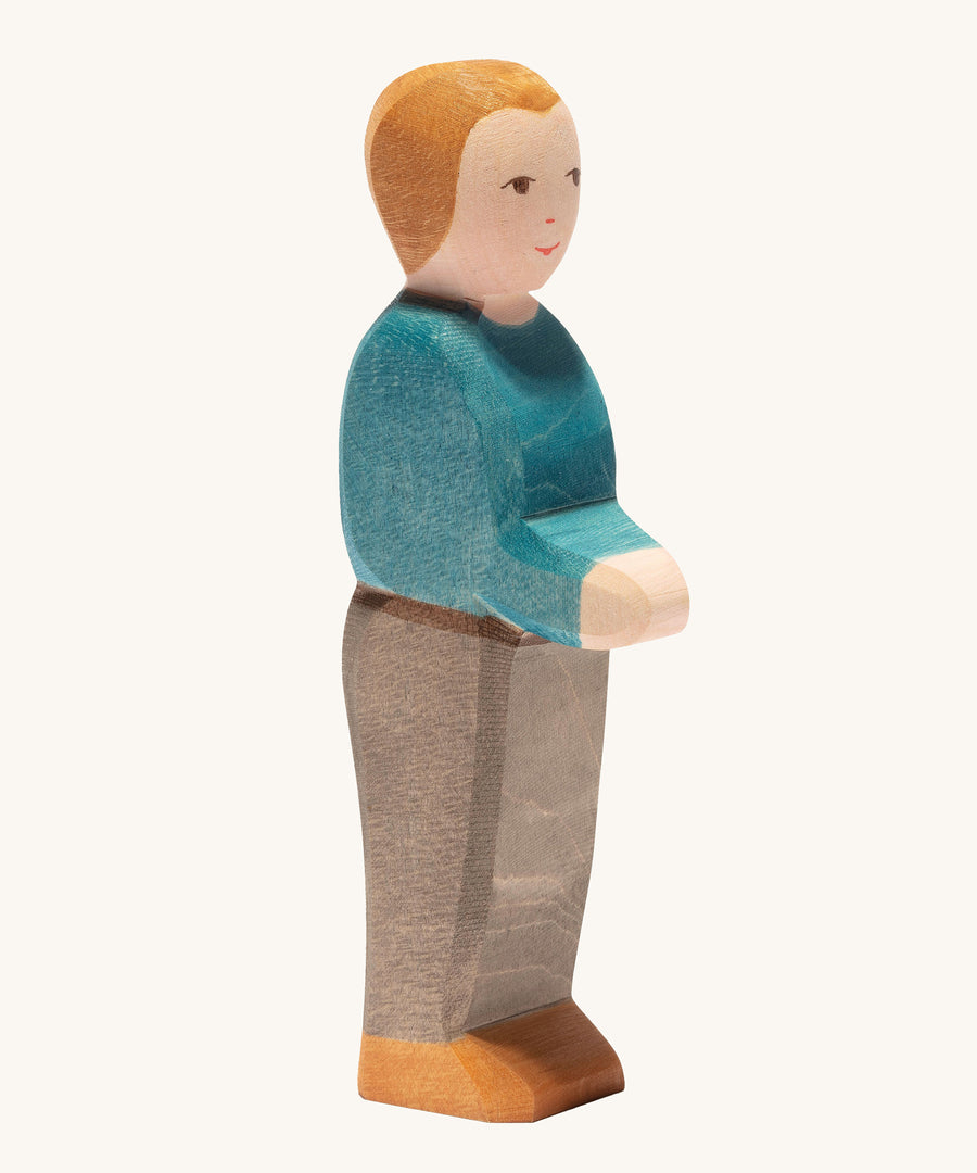 Ostheimer father wooden toy figure with white skin on a plain background.