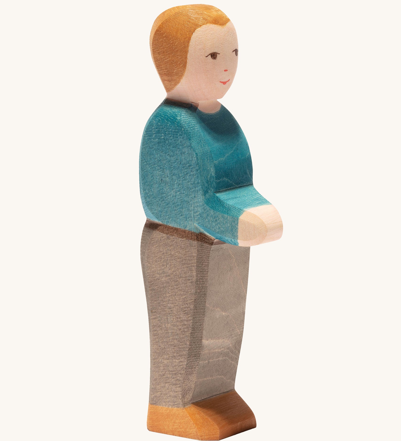 Ostheimer father wooden toy figure with white skin on a plain background.