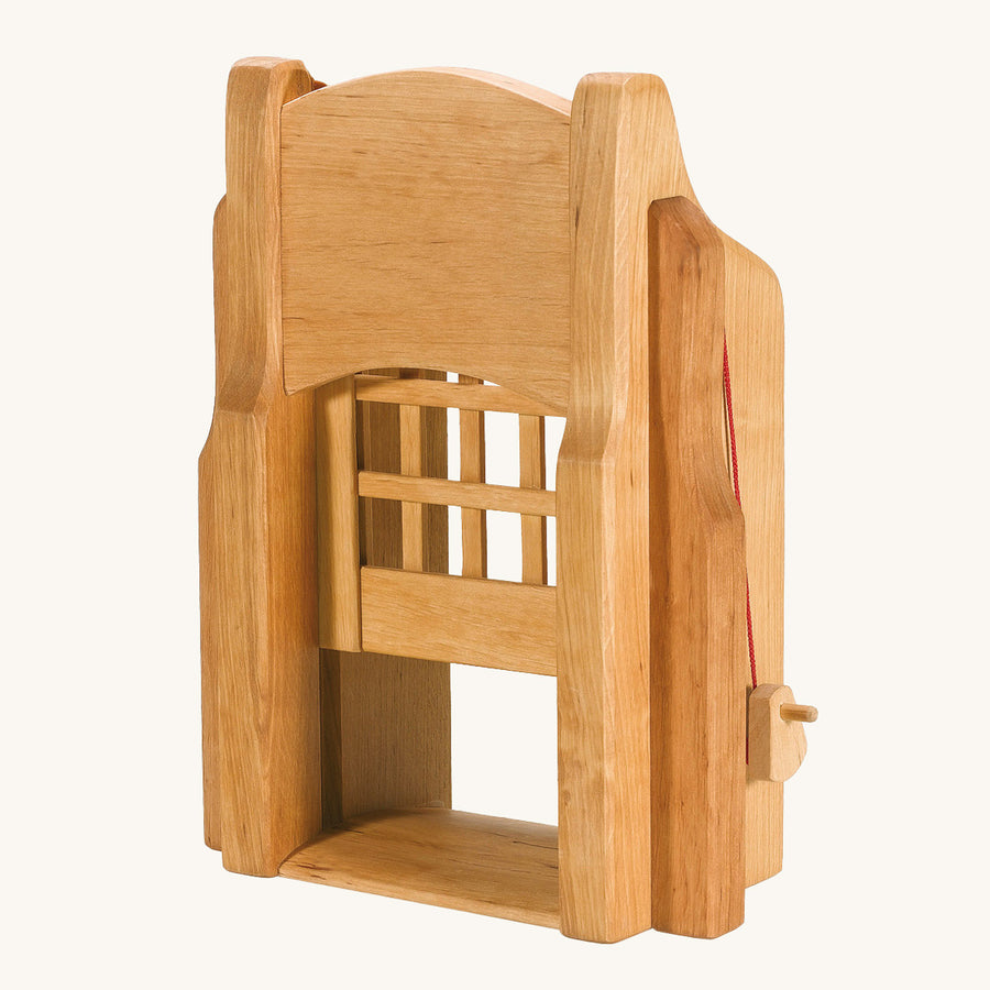 Ostheimer kids handmade wooden castle portcullis gate toy on a beige background