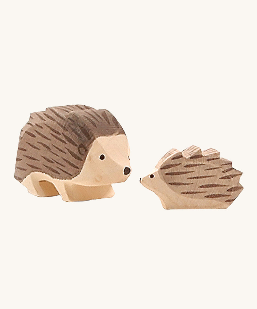 Ostheimer Hedgehogs woodnen toy figures on a plain background. 