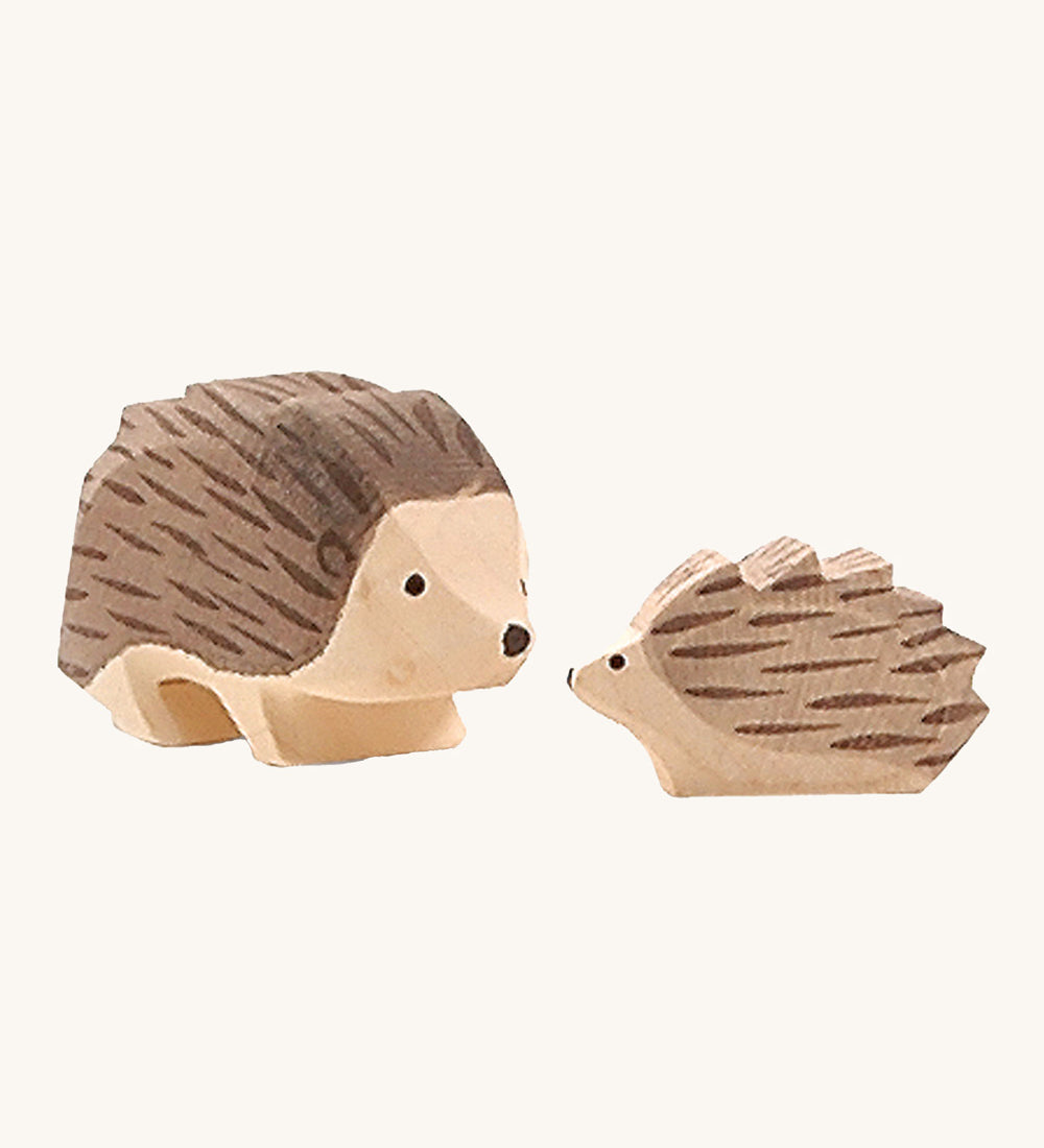 Ostheimer Hedgehogs woodnen toy figures on a plain background. 