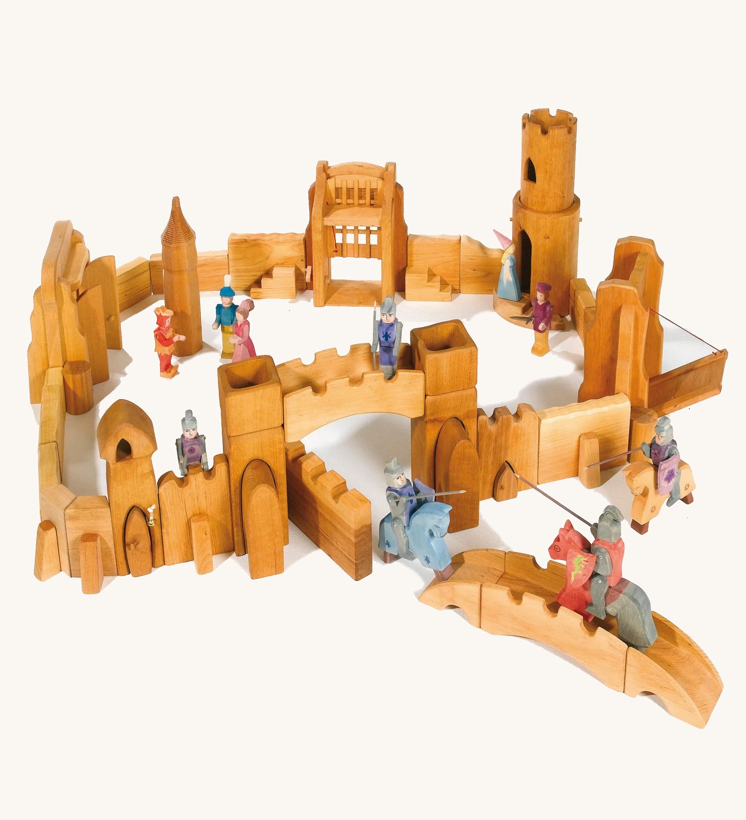 Ostheimer kids wooden castle toy set laid out on a cream background