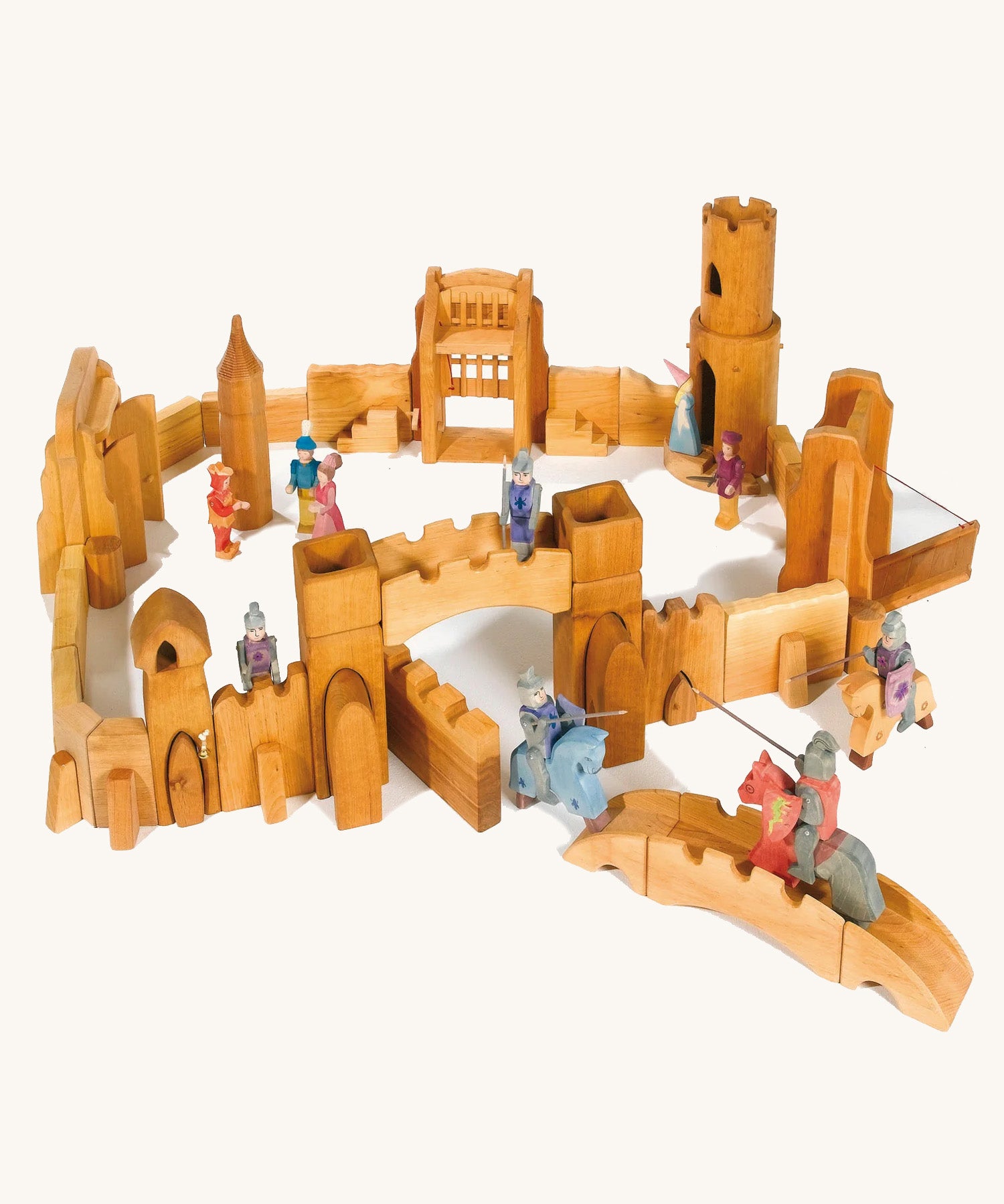 Ostheimer kids wooden castle toy set laid out on a cream background