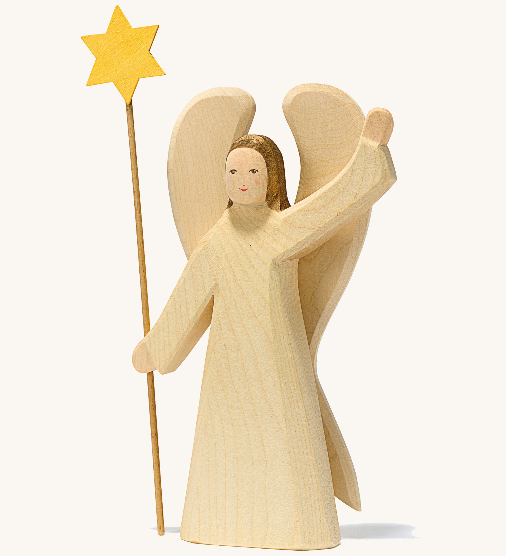 A large waving angel holding a staff with a yellow star on a cream background.