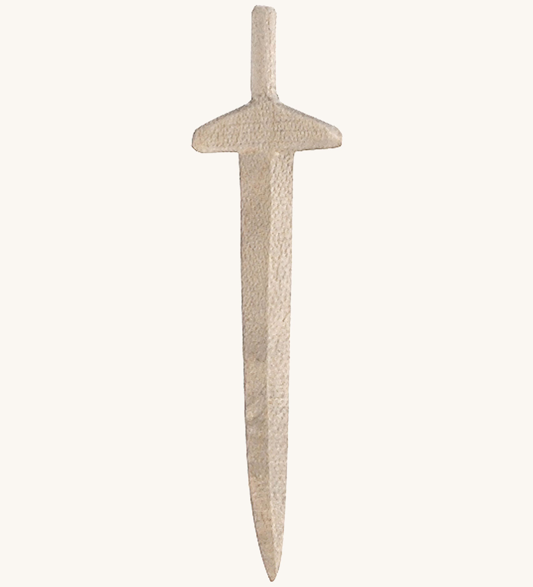 A long wooden sword on a cream background