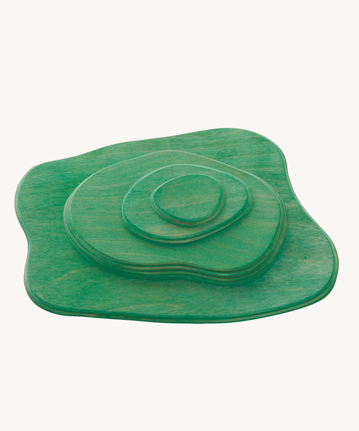 Ostheimer green Meadow wooden toy plates on a plain background. 