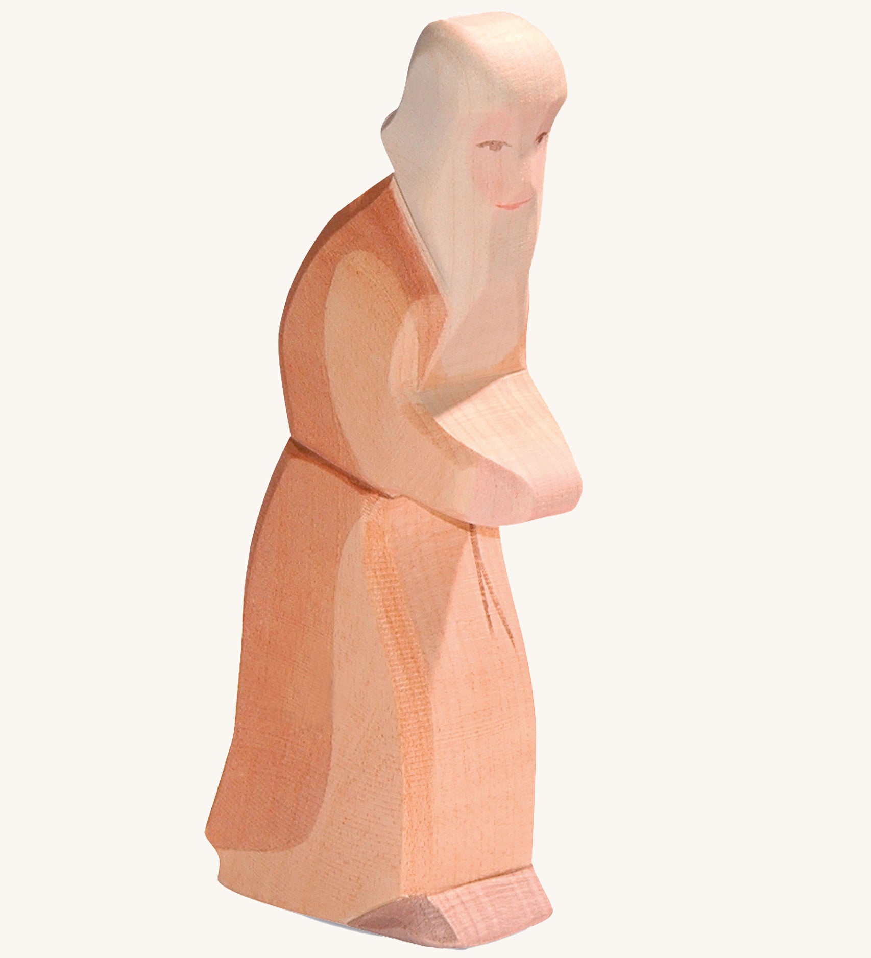 Ostheimer wooden Noah figure toy on a plain background. 