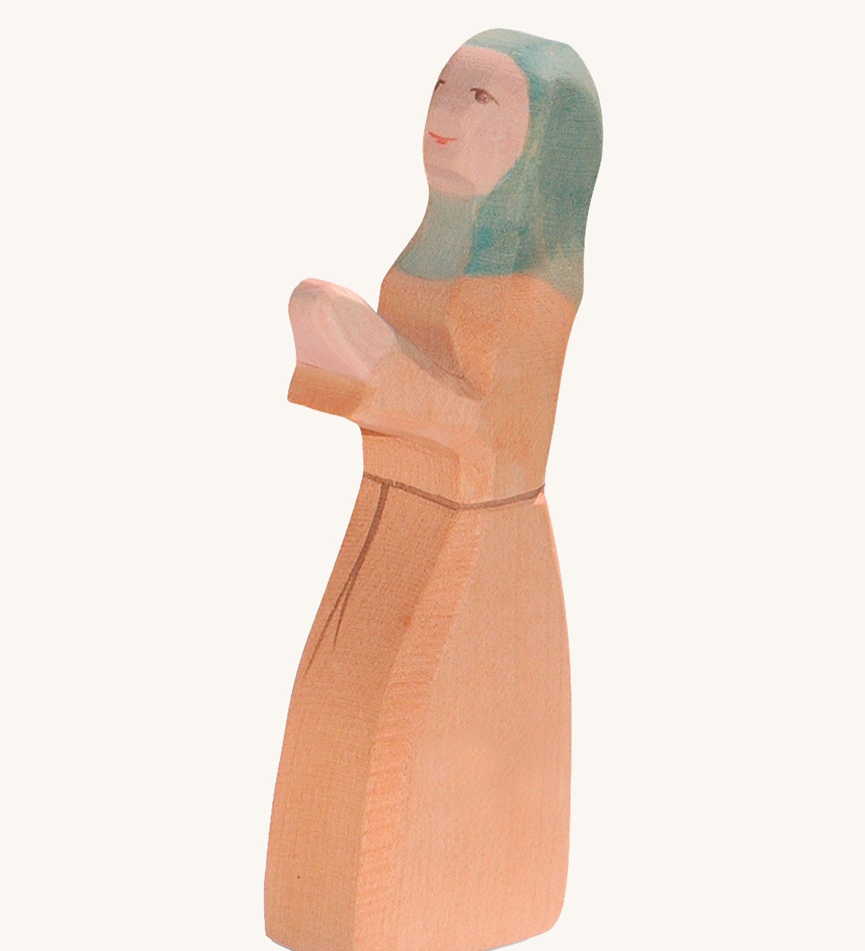 Ostheimer Noah's Wife wooden toy figure on a plain background. 