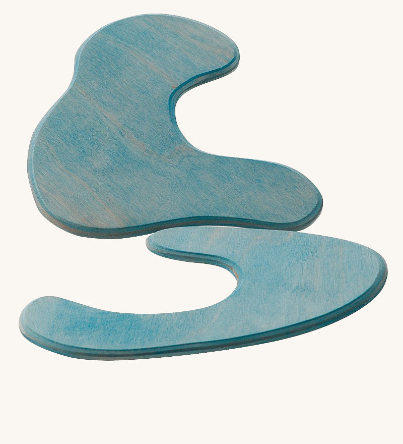 Ostheimer blue Pond Plates wooden toys on a plain background. 