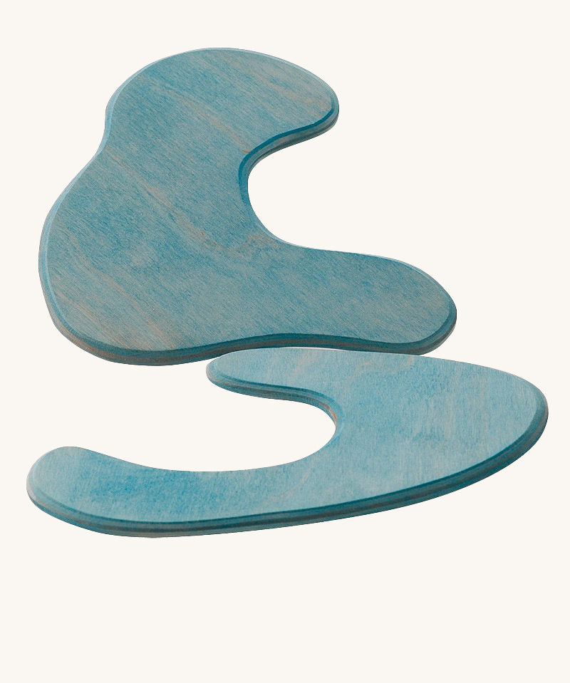 Ostheimer blue Pond Plates wooden toys on a plain background. 