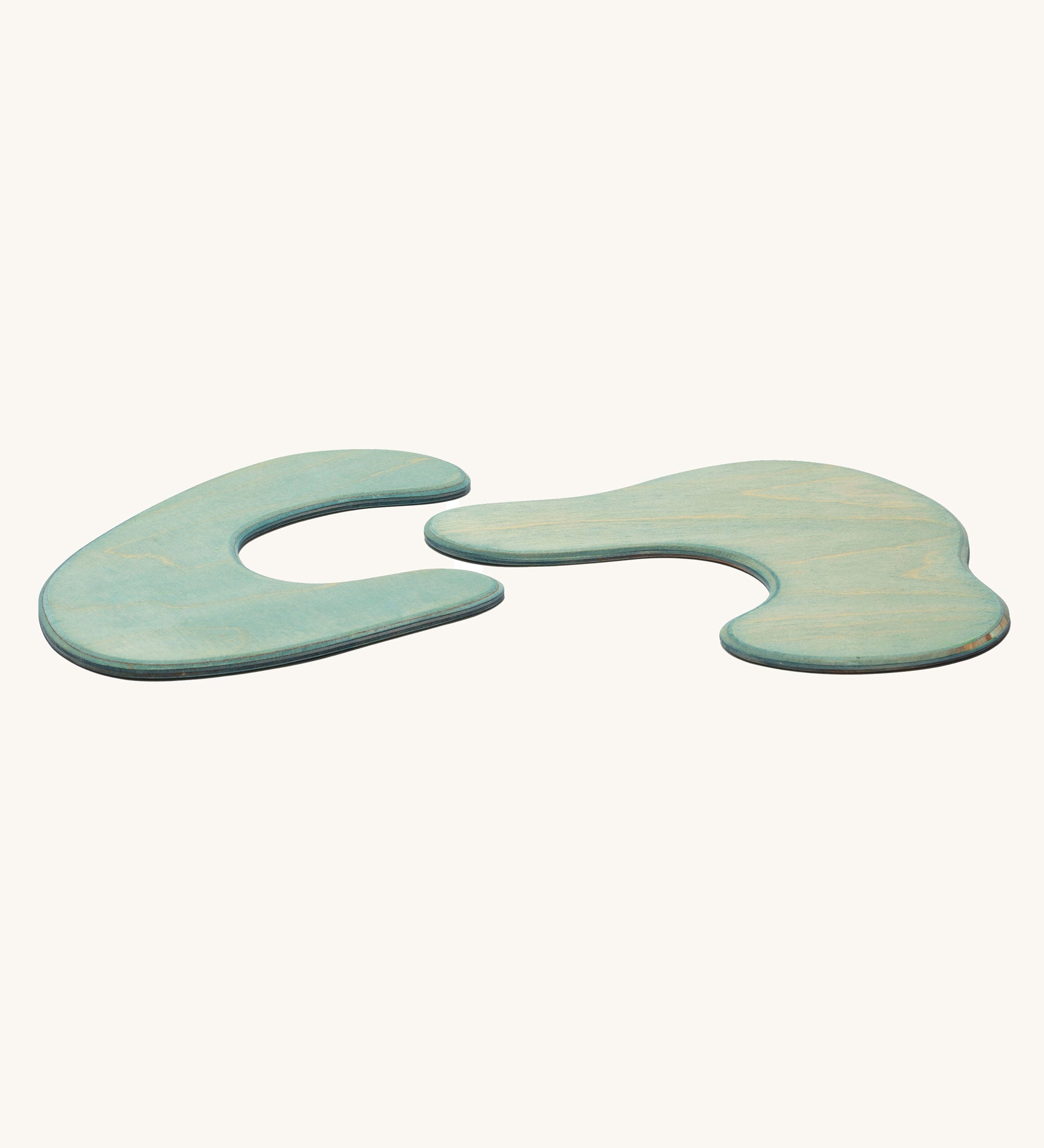 Ostheimer blue Pond Plates wooden toys on a plain background. 