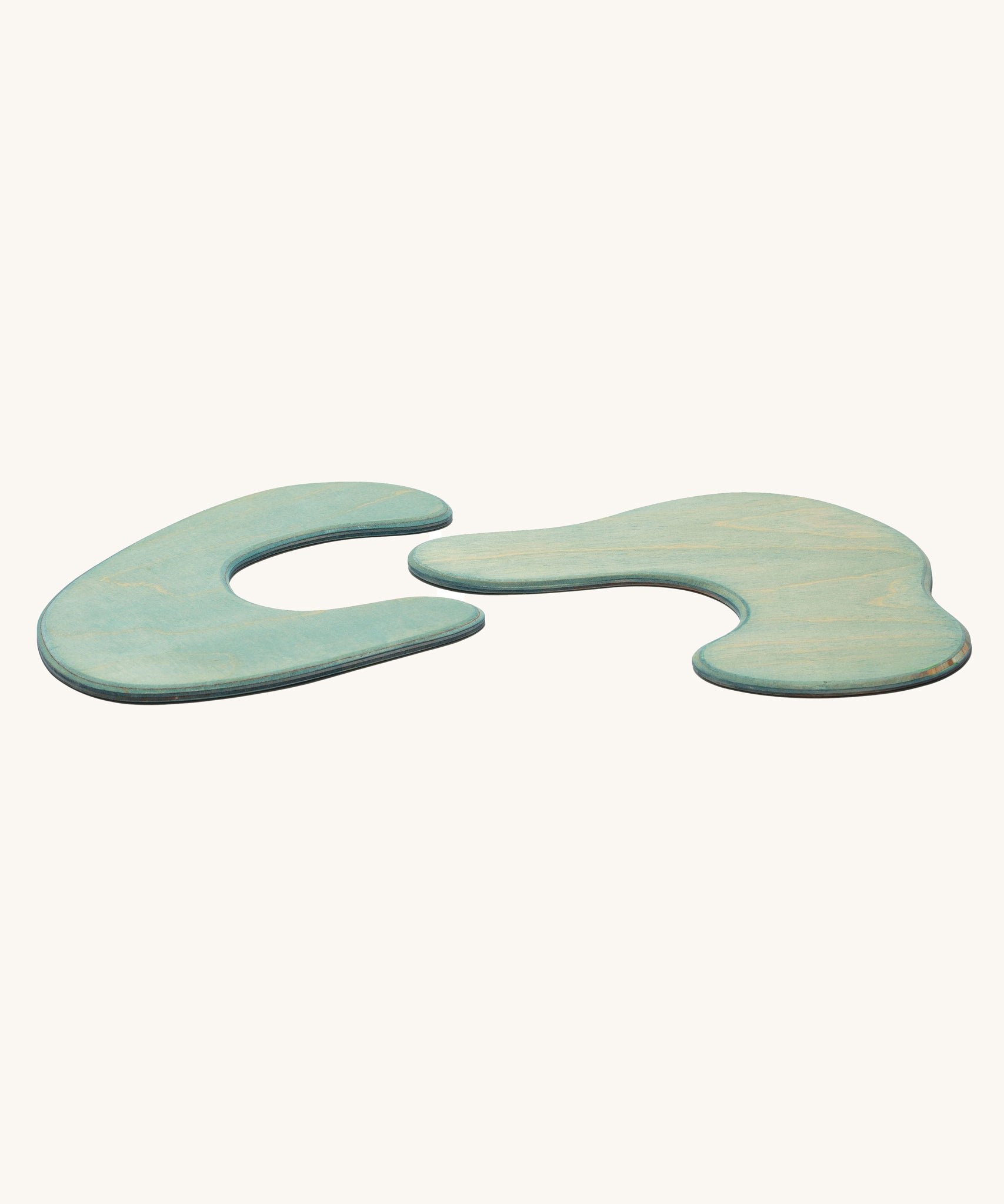 Ostheimer blue Pond Plates wooden toys on a plain background. 