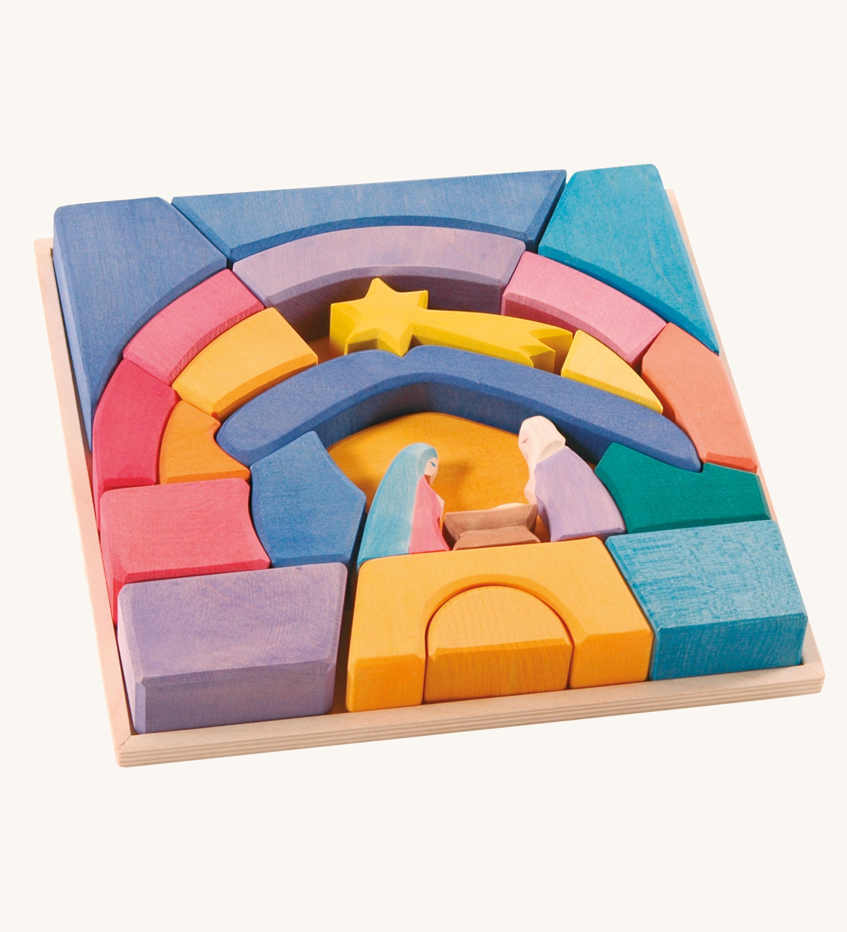 The Ostheimer Rainbow Nativity Block set in the wooden frame they come with on a plain background.