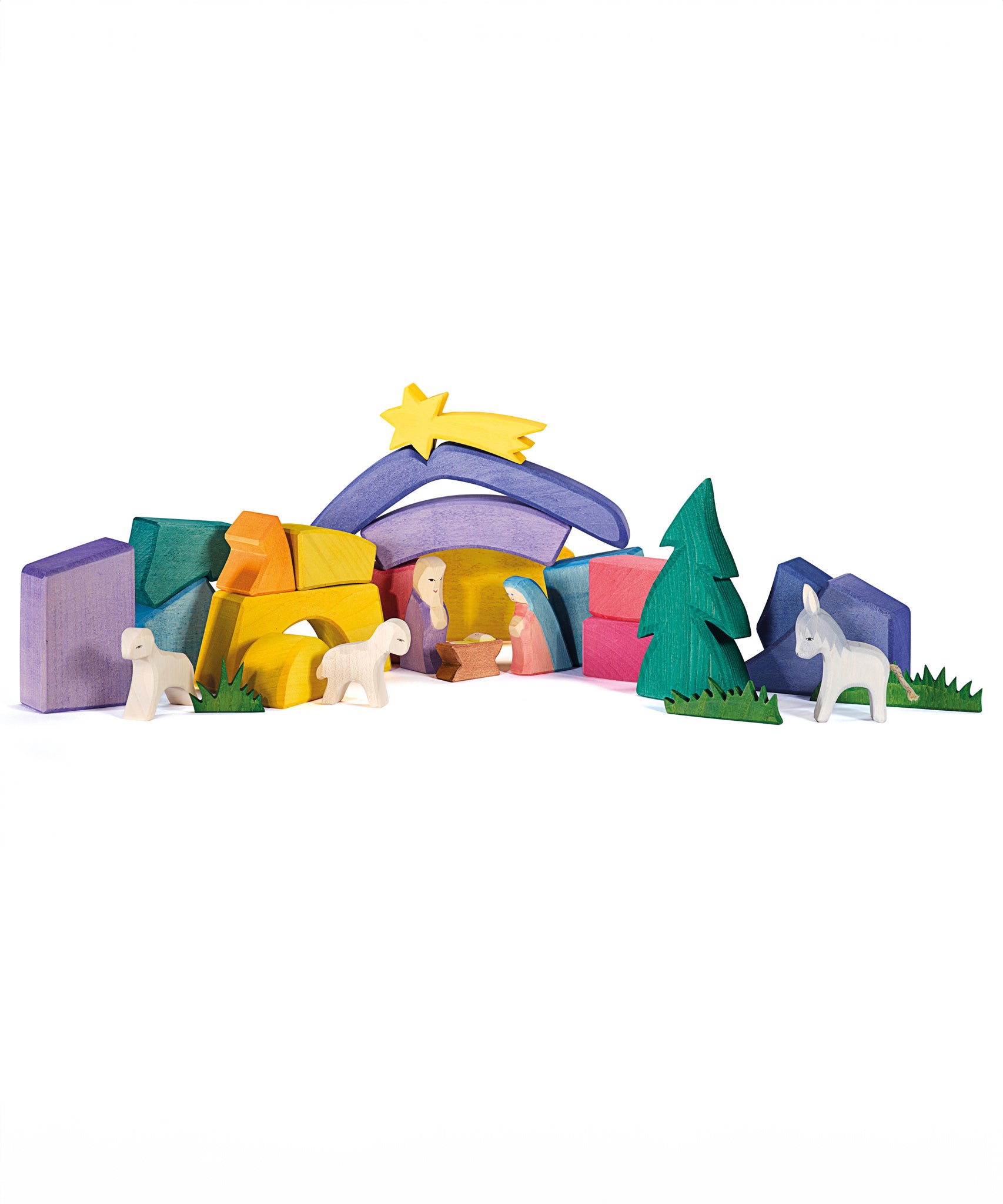 Ostheimer Rainbow Nativity Blocks set up in a little play scene with other Ostheimer figures and scene pieces. 