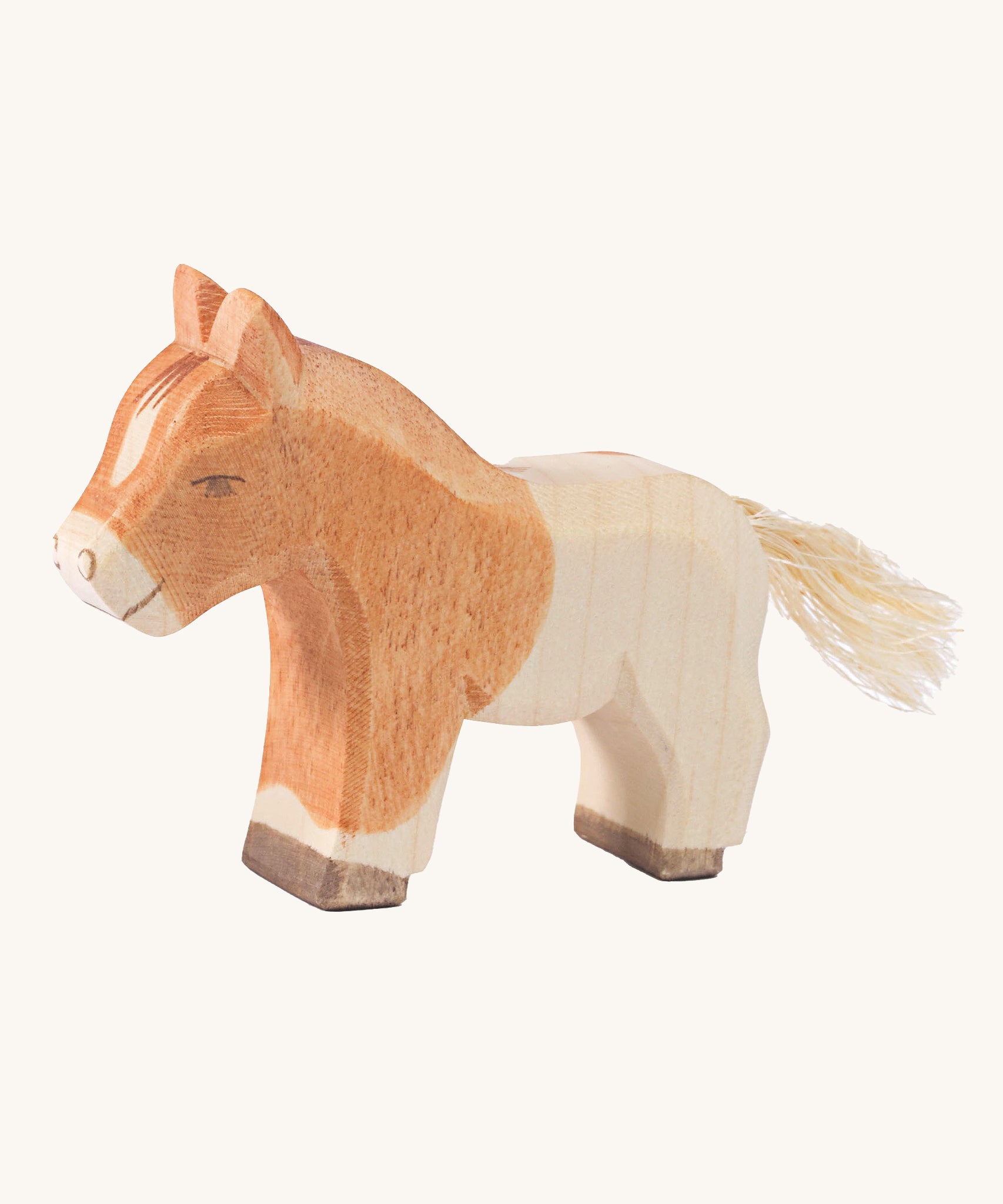 Ostheimer Shetland Colt wooden toy figure on a plain background. 