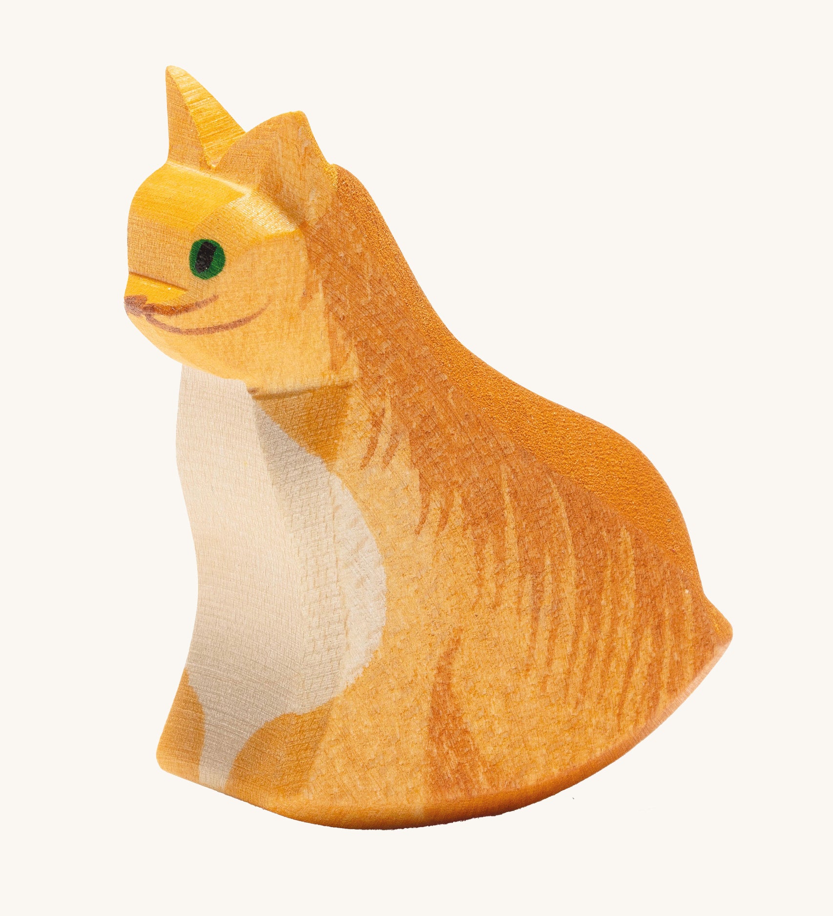 Ostheimer sitting cat wooden toy figure on a plain background.