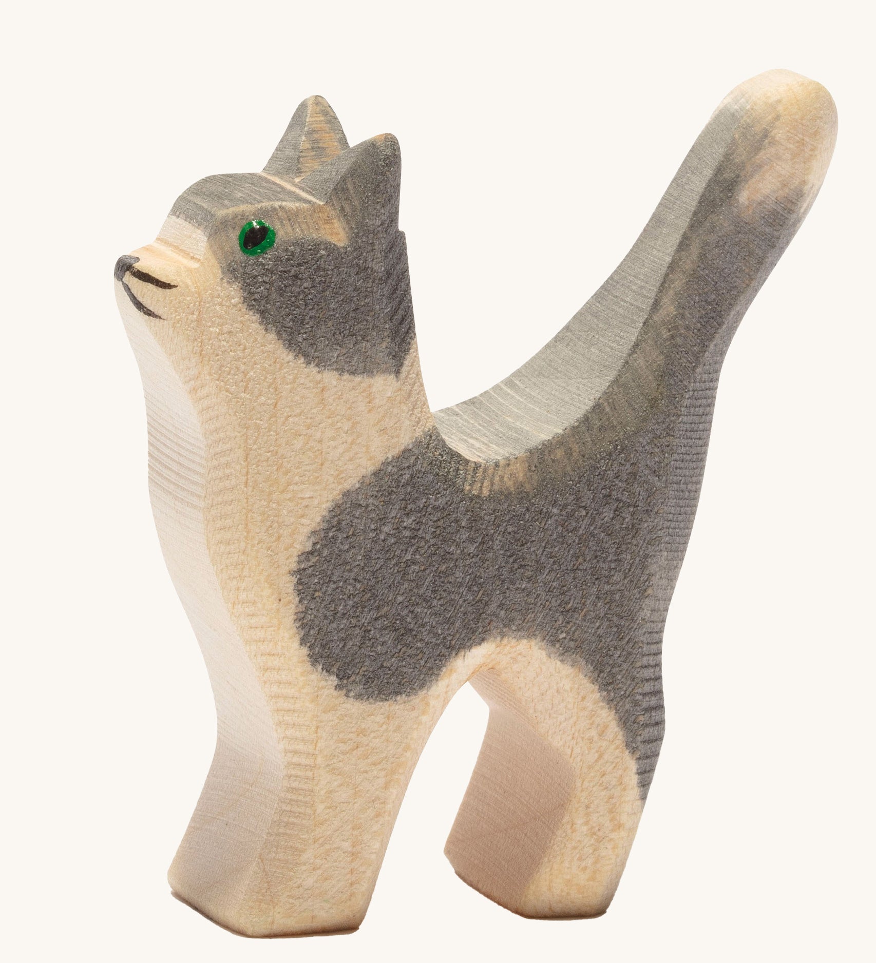 Ostheimer Small Cat toy figure with it's Head held High on a plain background.