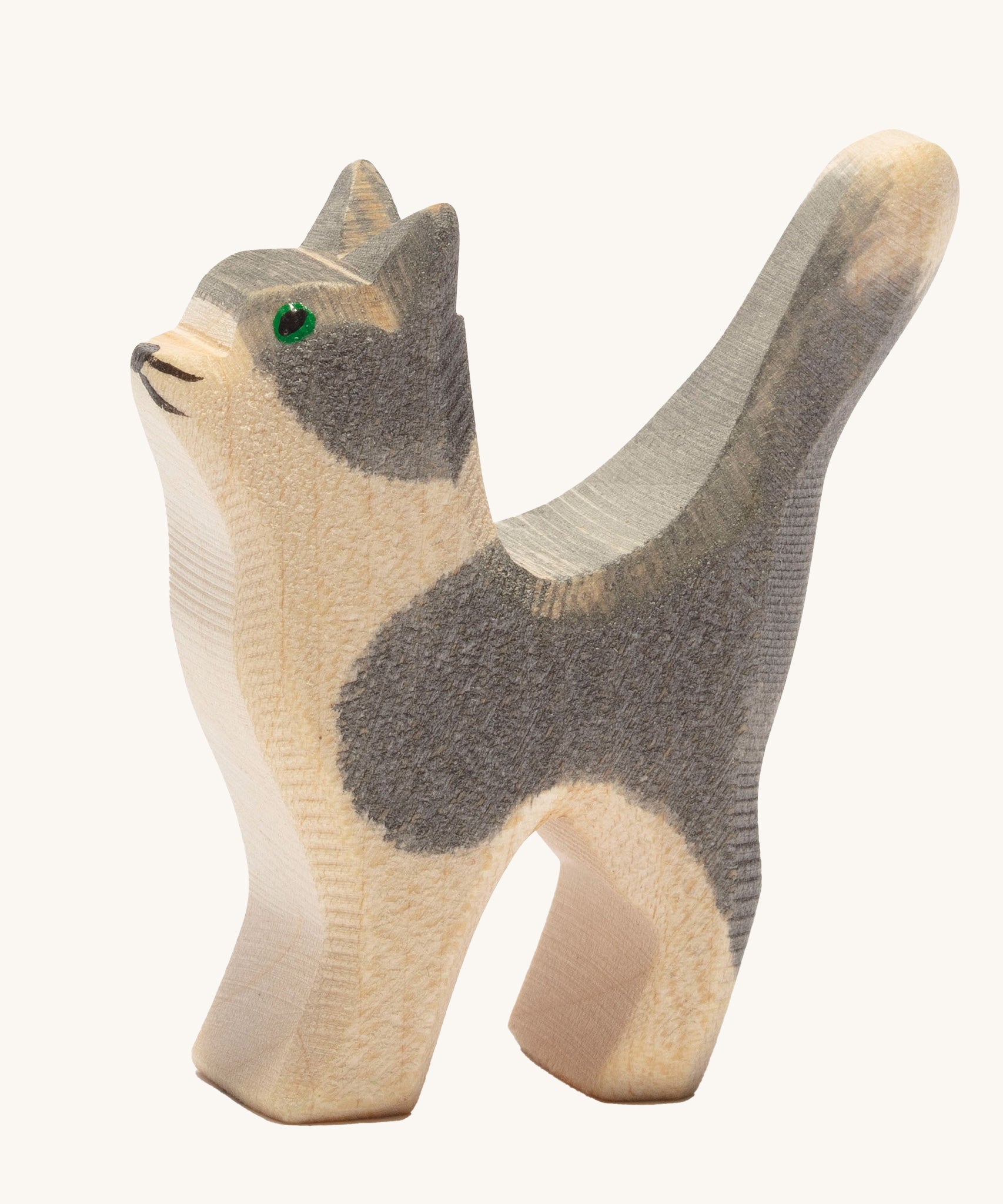 Ostheimer Small Cat toy figure with it's Head held High on a plain background.