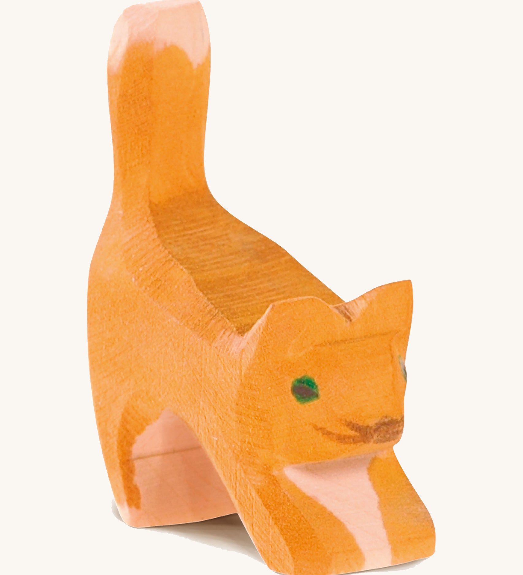 Ostheimer Small Cat toy figure with it's Head Low on a plain background. 