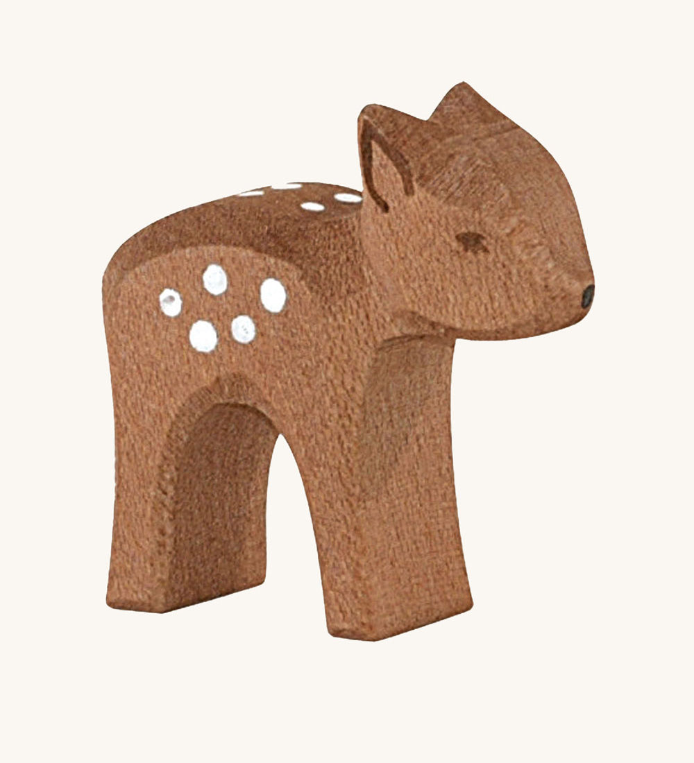 Ostheimer small deer wooden toy figure on a plain background. 