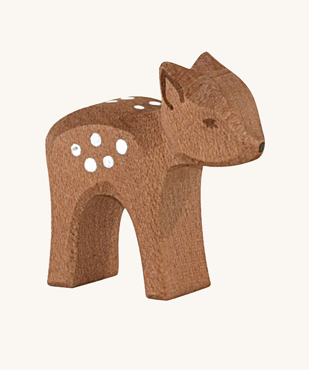 Ostheimer small deer wooden toy figure on a plain background. 