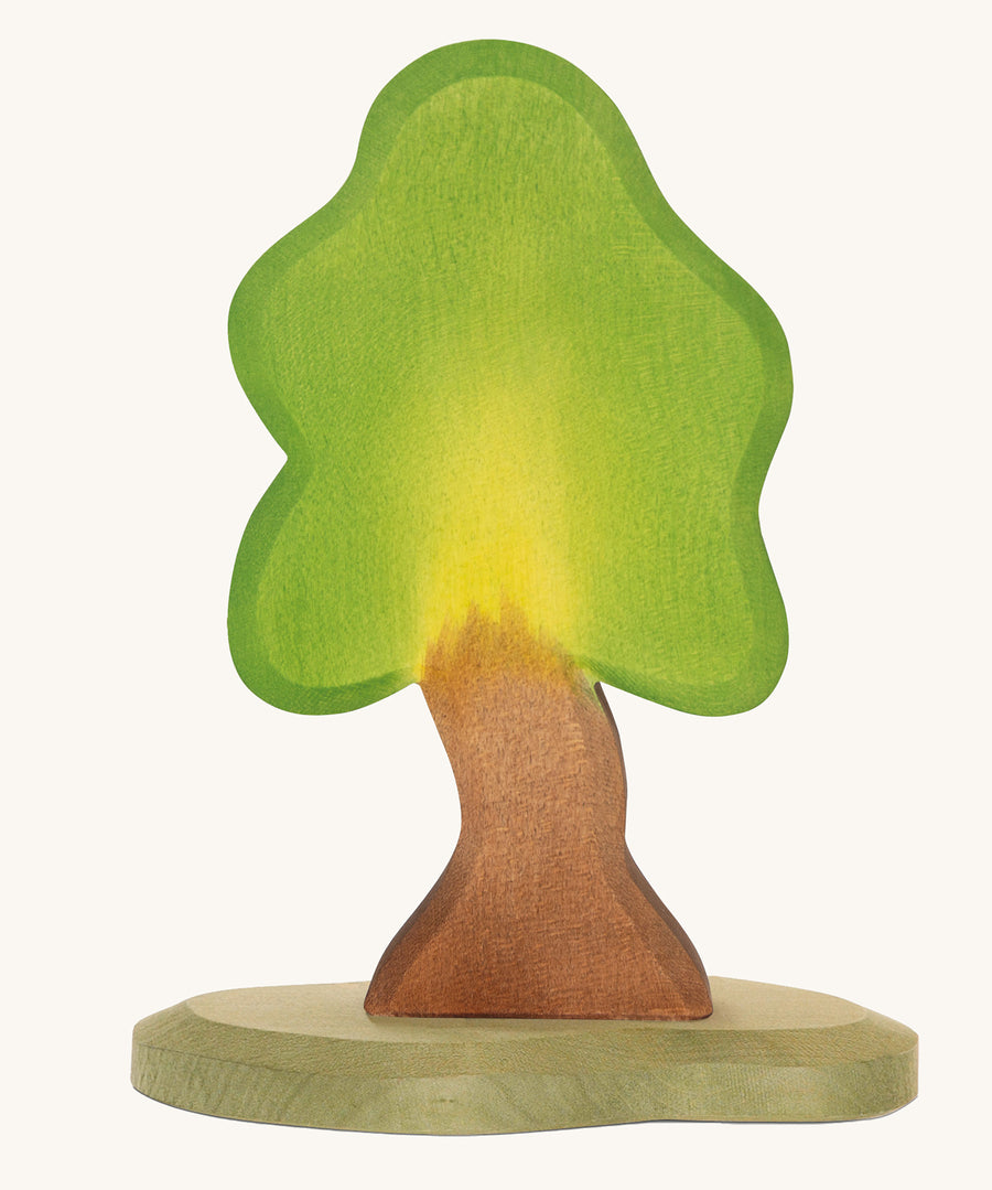 Ostheimer Small Oak Tree & Support wooden toy figures on a plain background. 