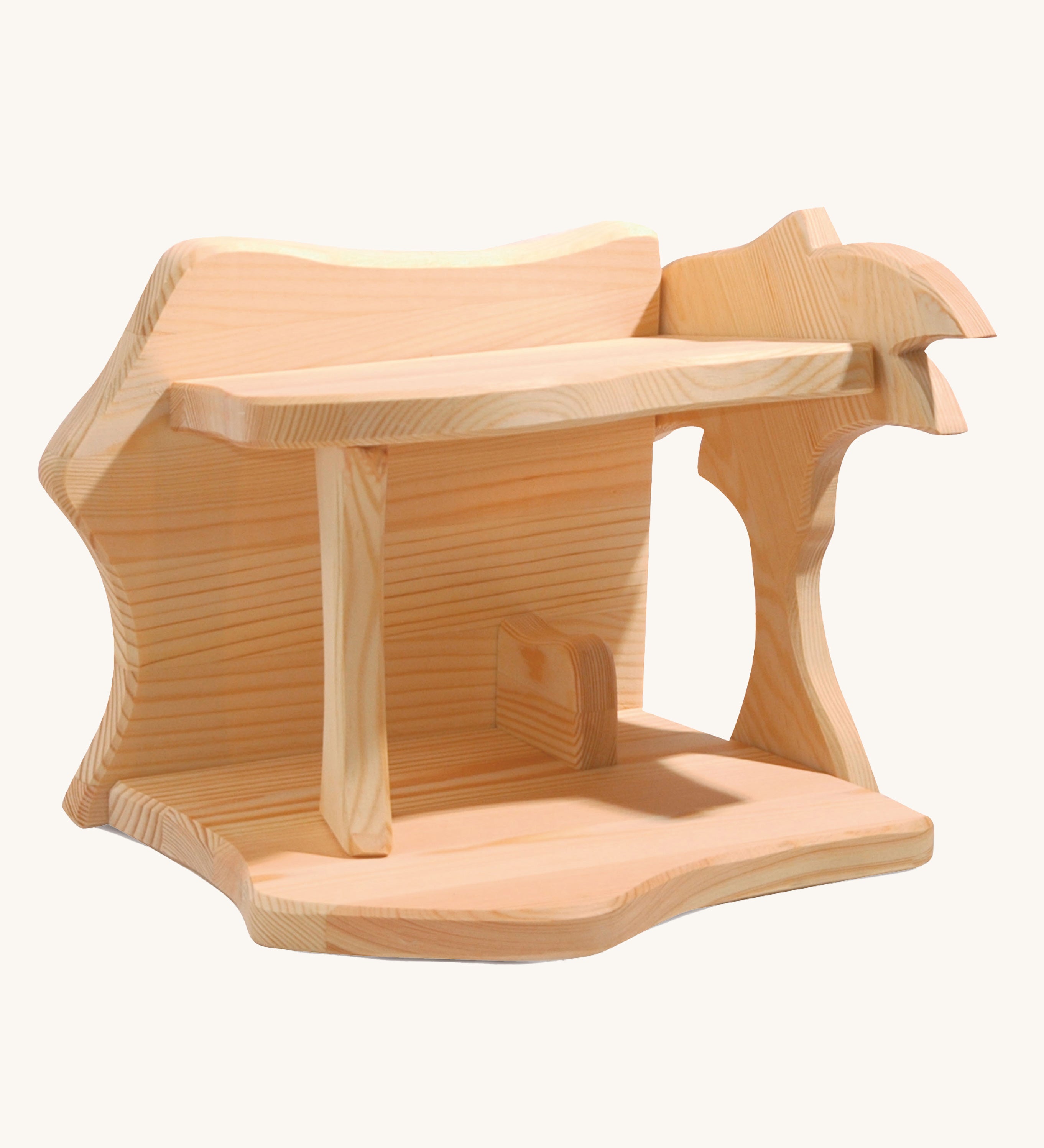 Ostheimer small wooden toy stable on a plain background. 