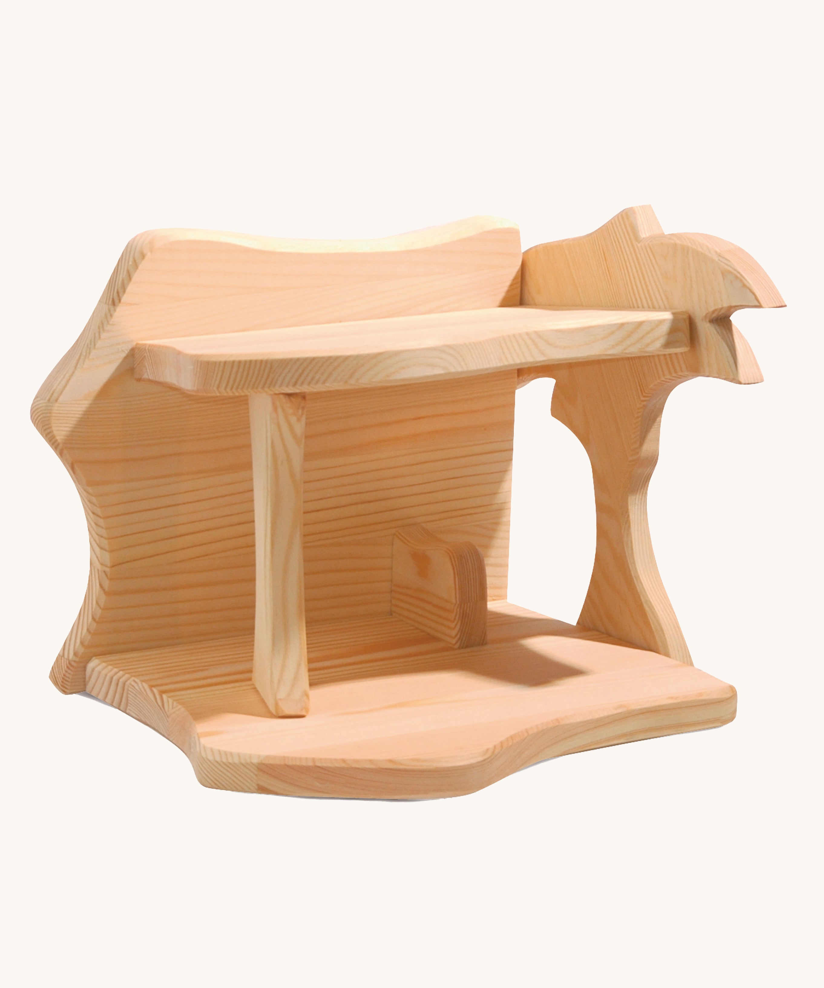 Ostheimer small wooden toy stable on a plain background. 