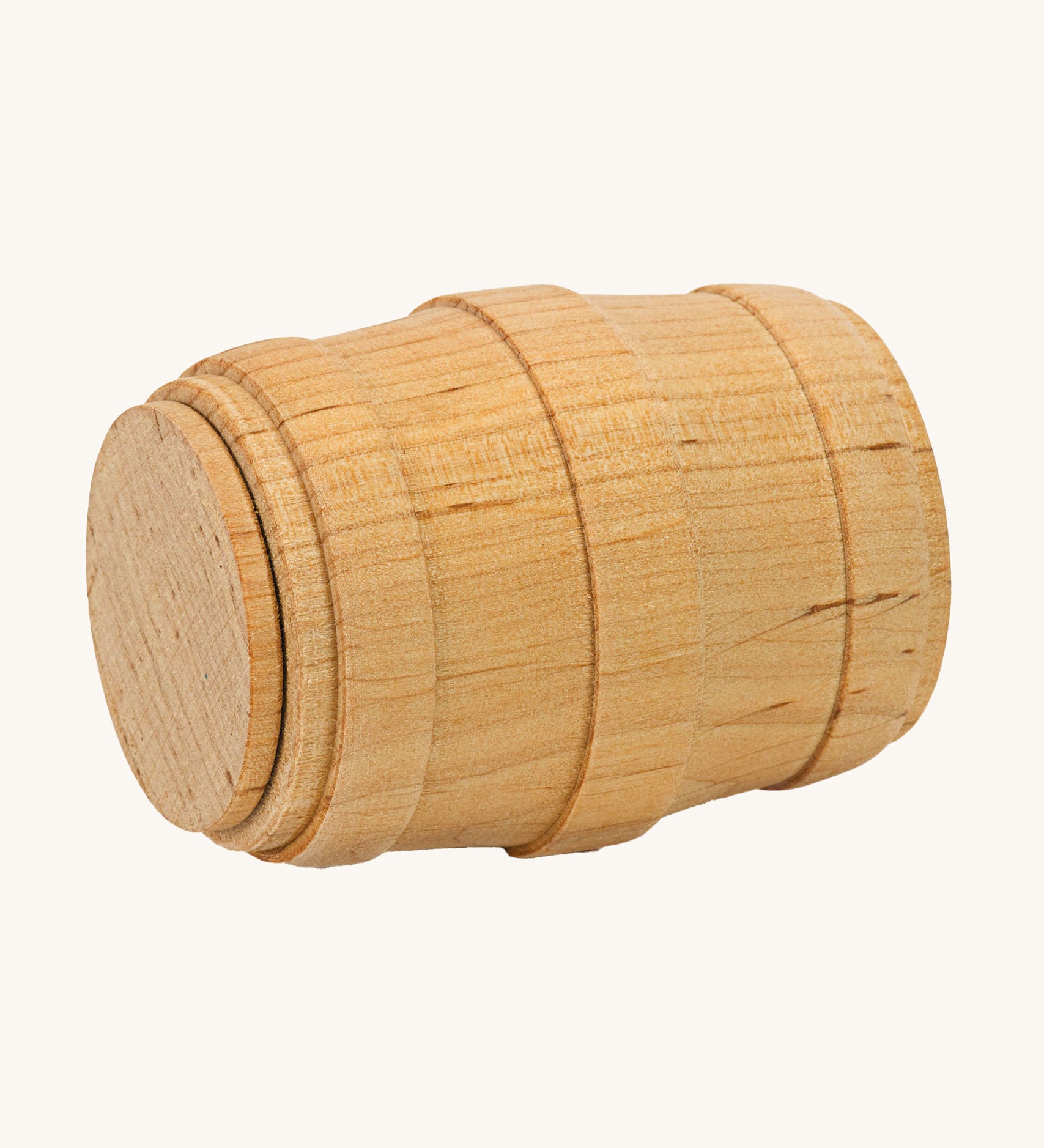 Ostheimer small wooden toy Barrel on a plain background. The barrel is shown on it's side. 