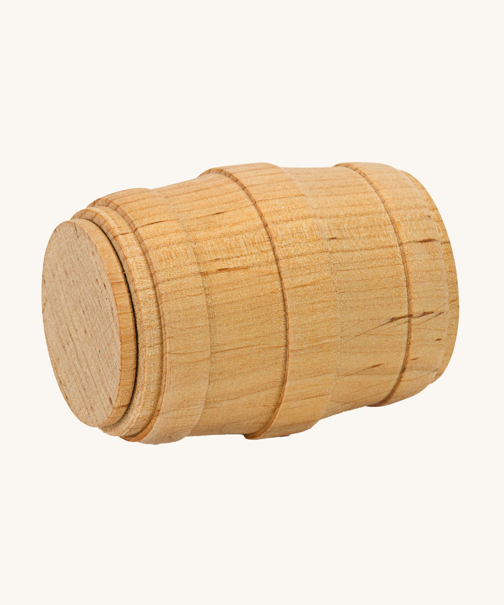 Ostheimer small wooden toy Barrel on a plain background. The barrel is shown on it's side. 