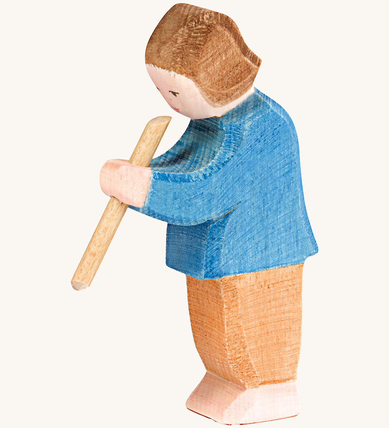 Ostheimer Son figure Playing Flute on a plain background. 