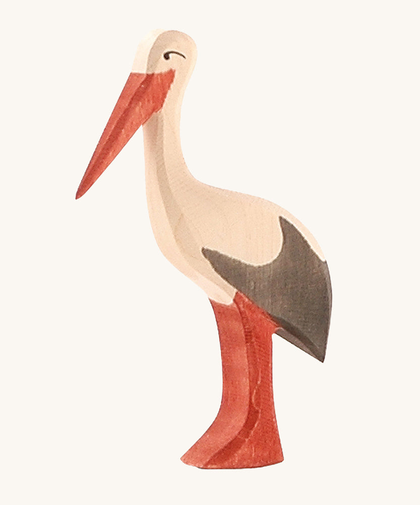 Ostheimer Stork wooden toy figure on a plain background. 