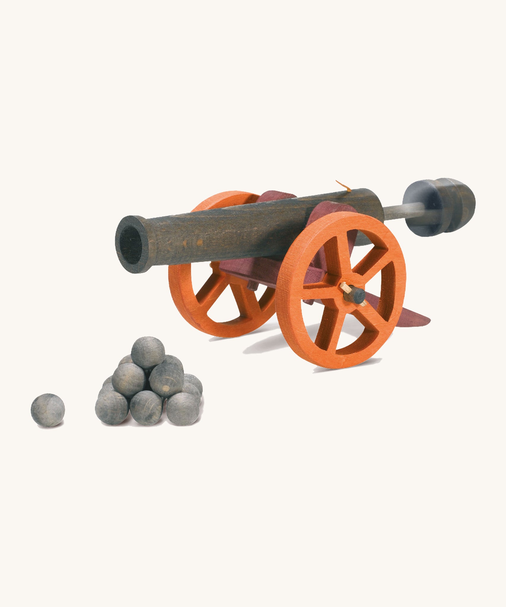 A wooden Ostheimer cannon firing the Ostheimer mini cannon balls on a cream background.