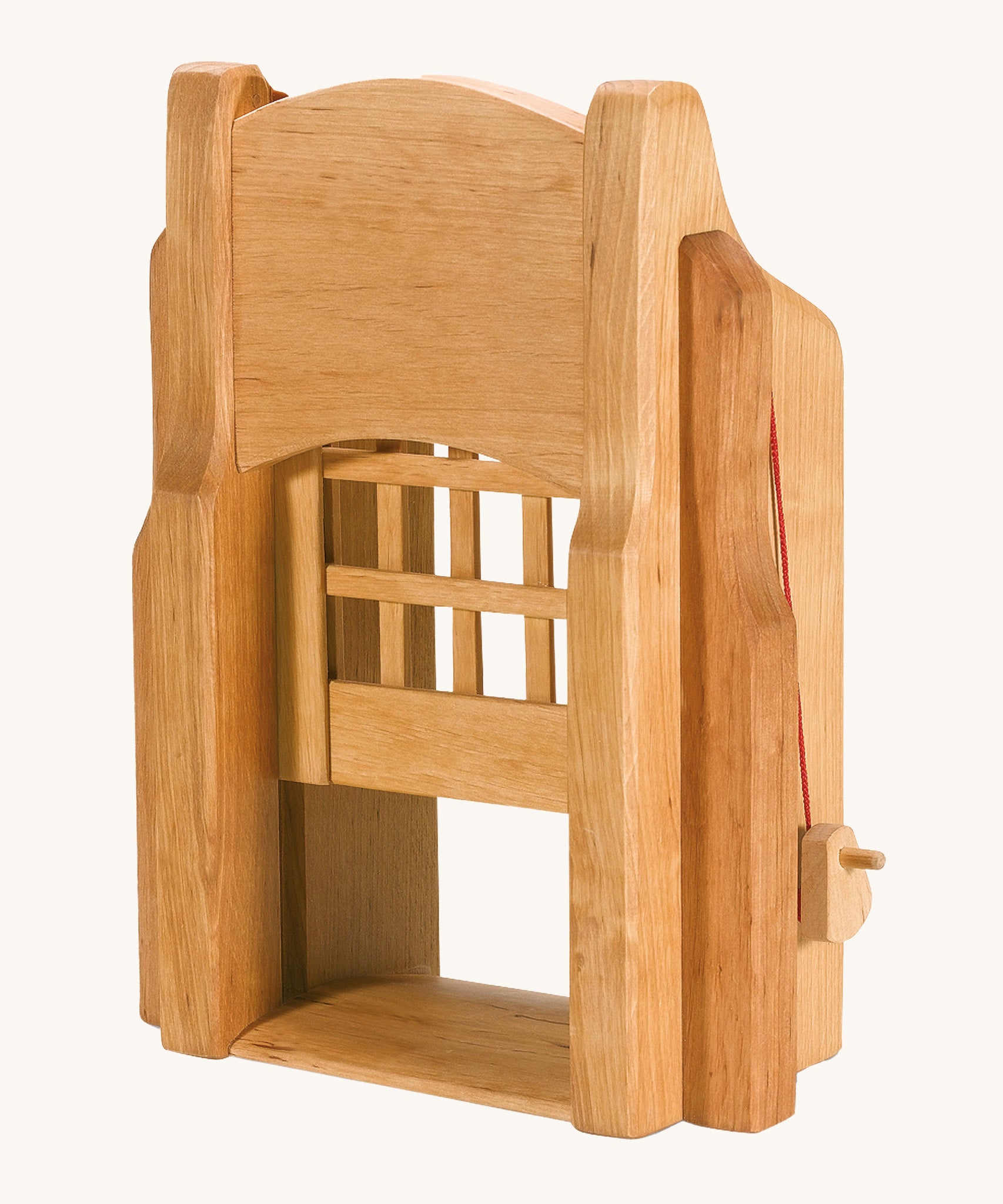 Ostheimer kids handmade wooden castle portcullis gate toy on a cream background