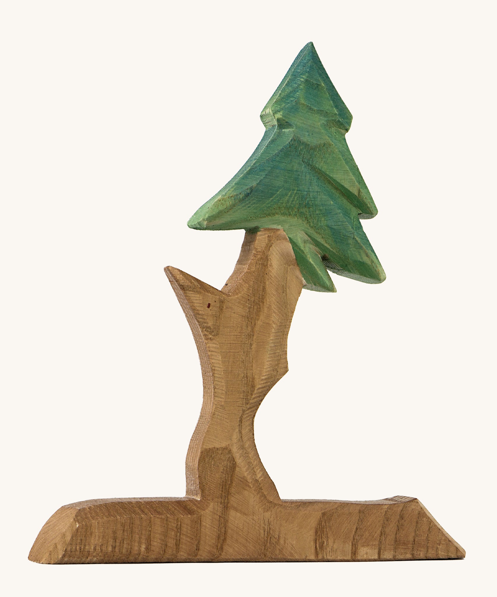 A wooden Ostheimer fir free for dwarves on a cream background.